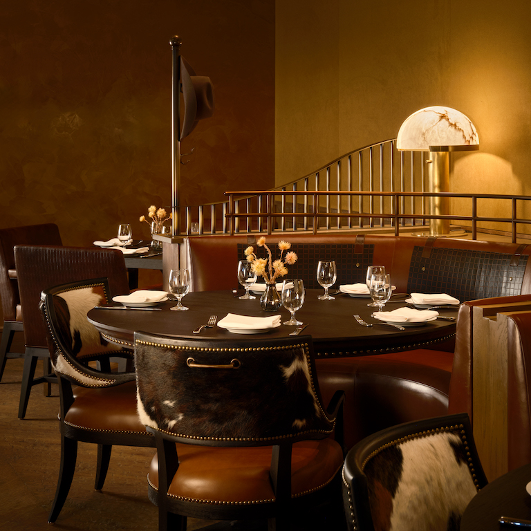 Table setting in the warm, elegant dining room